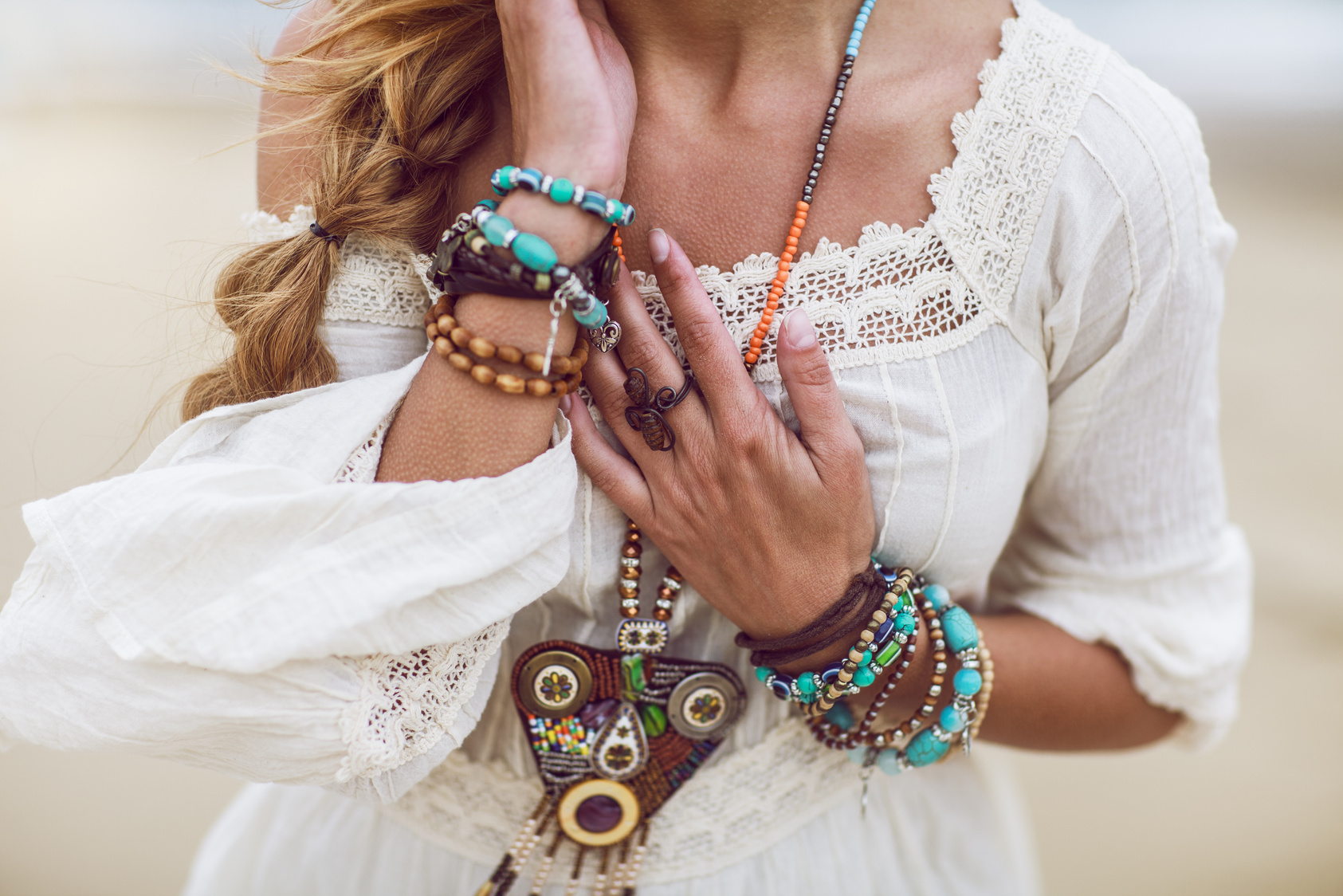 Boho woman with multicolored jewelry