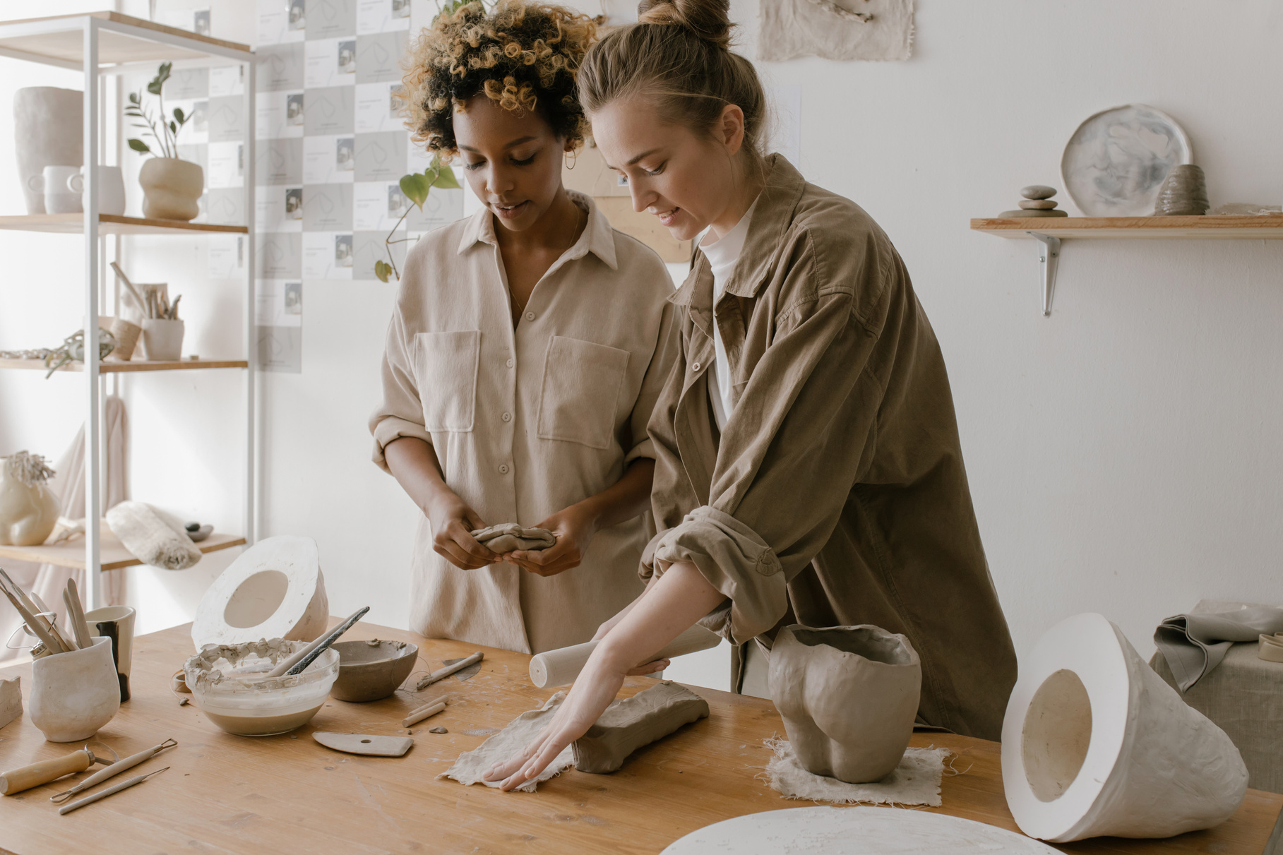 Women Molding a Clay